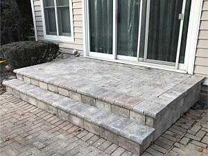unilock brussels backyard stoop step porch patio door bullnose tumbled stasi dix hills pavers brick paver